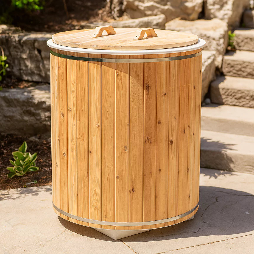 Rustic Baltic Cold Plunge Tub made of Eastern White Cedar, designed for cold therapy and wellness, showcasing natural wood grain with a sleek ergonomic design in an outdoor setting.-1