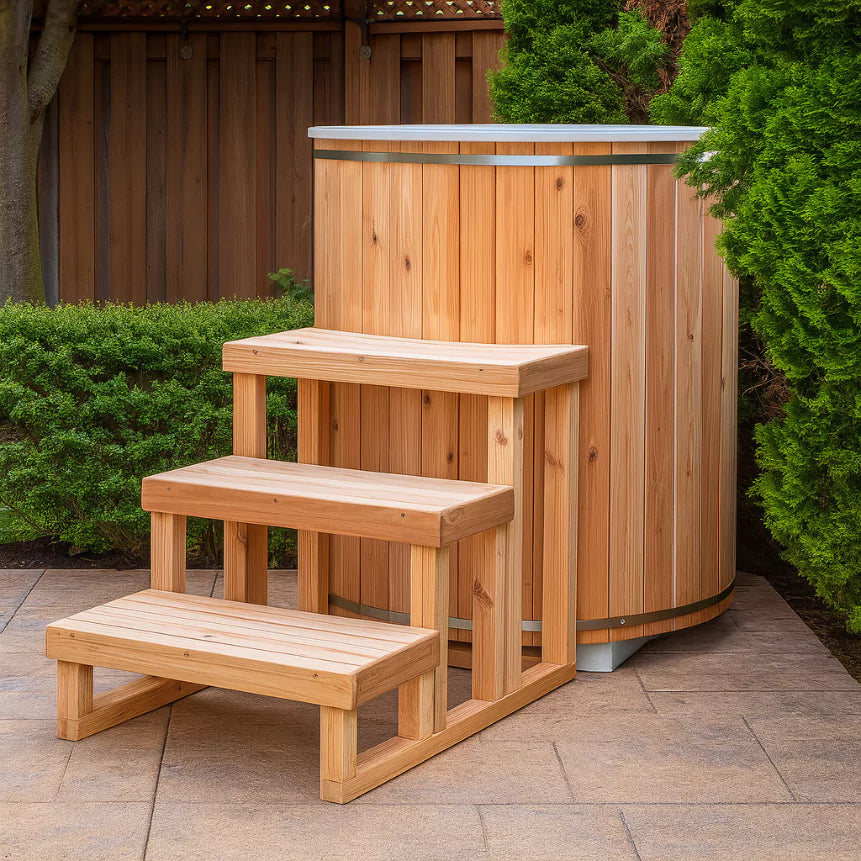Rustic Baltic Cold Plunge Tub made of Eastern White Cedar, designed for cold therapy and wellness, showcasing natural wood grain with a sleek ergonomic design in an outdoor setting.-2
