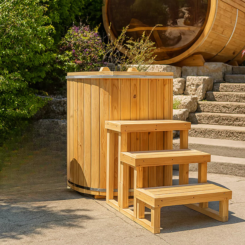 Rustic Baltic Cold Plunge Tub made of Eastern White Cedar, designed for cold therapy and wellness, showcasing natural wood grain with a sleek ergonomic design in an outdoor setting.